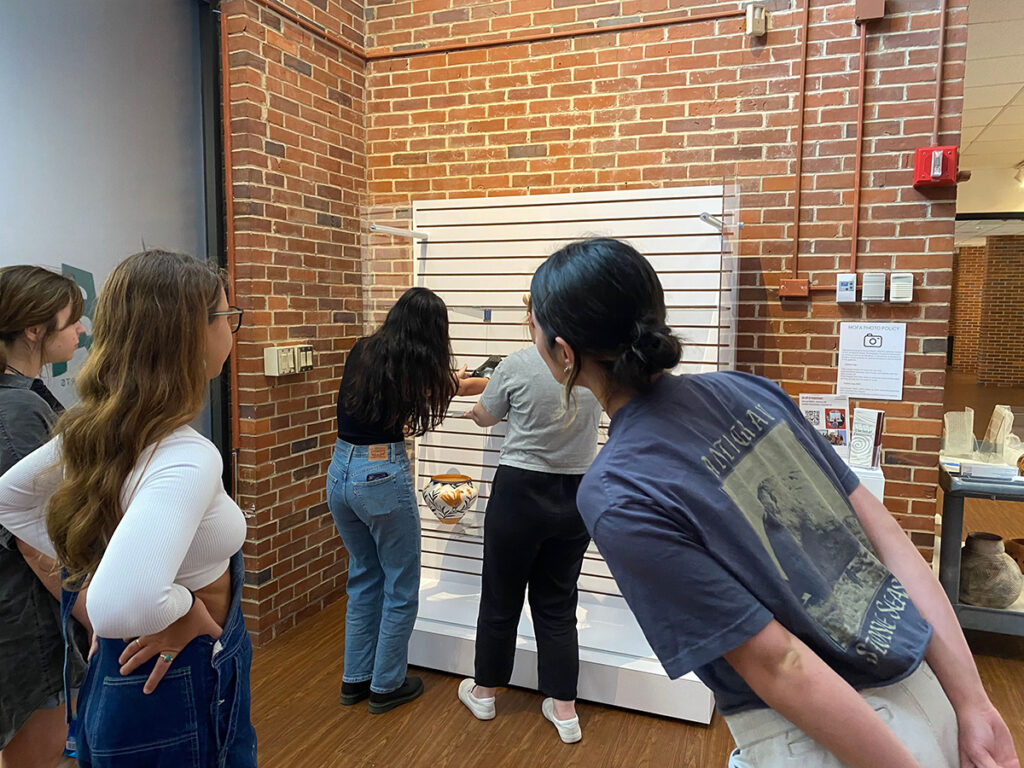 Art History Museum Object students preparing exhibition display at the FSU Museum of Fine Arts