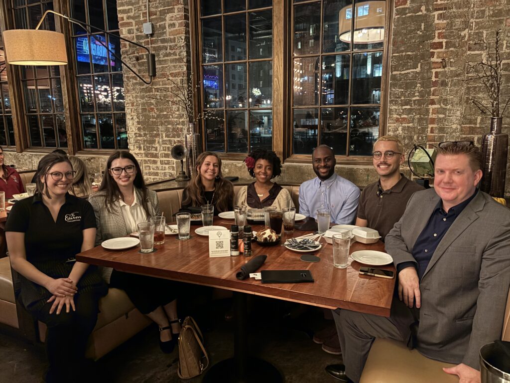 Art History Alumni Award recipients with students at dinner