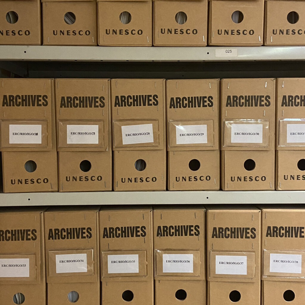 there are many boxes that are stacked on a shelf in a store