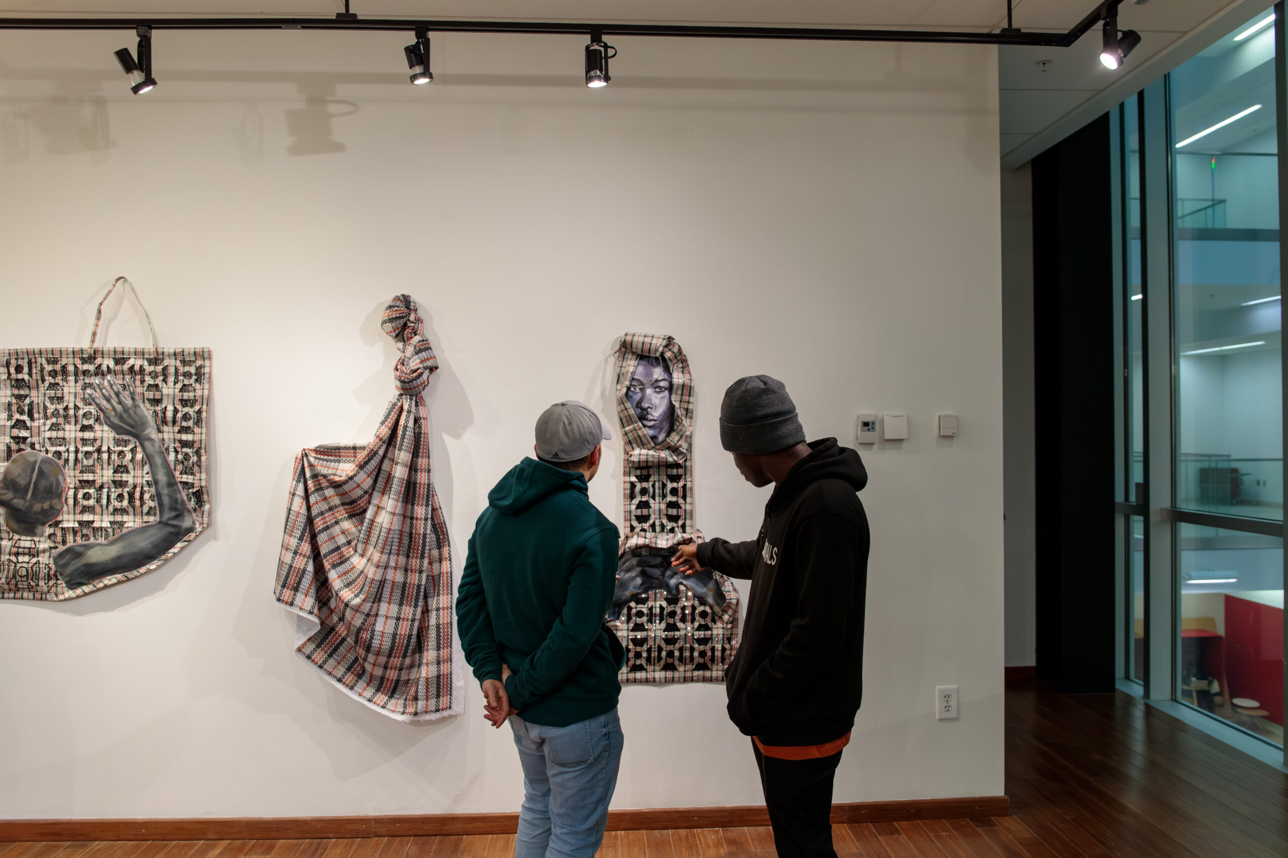 People looking at art in a museum